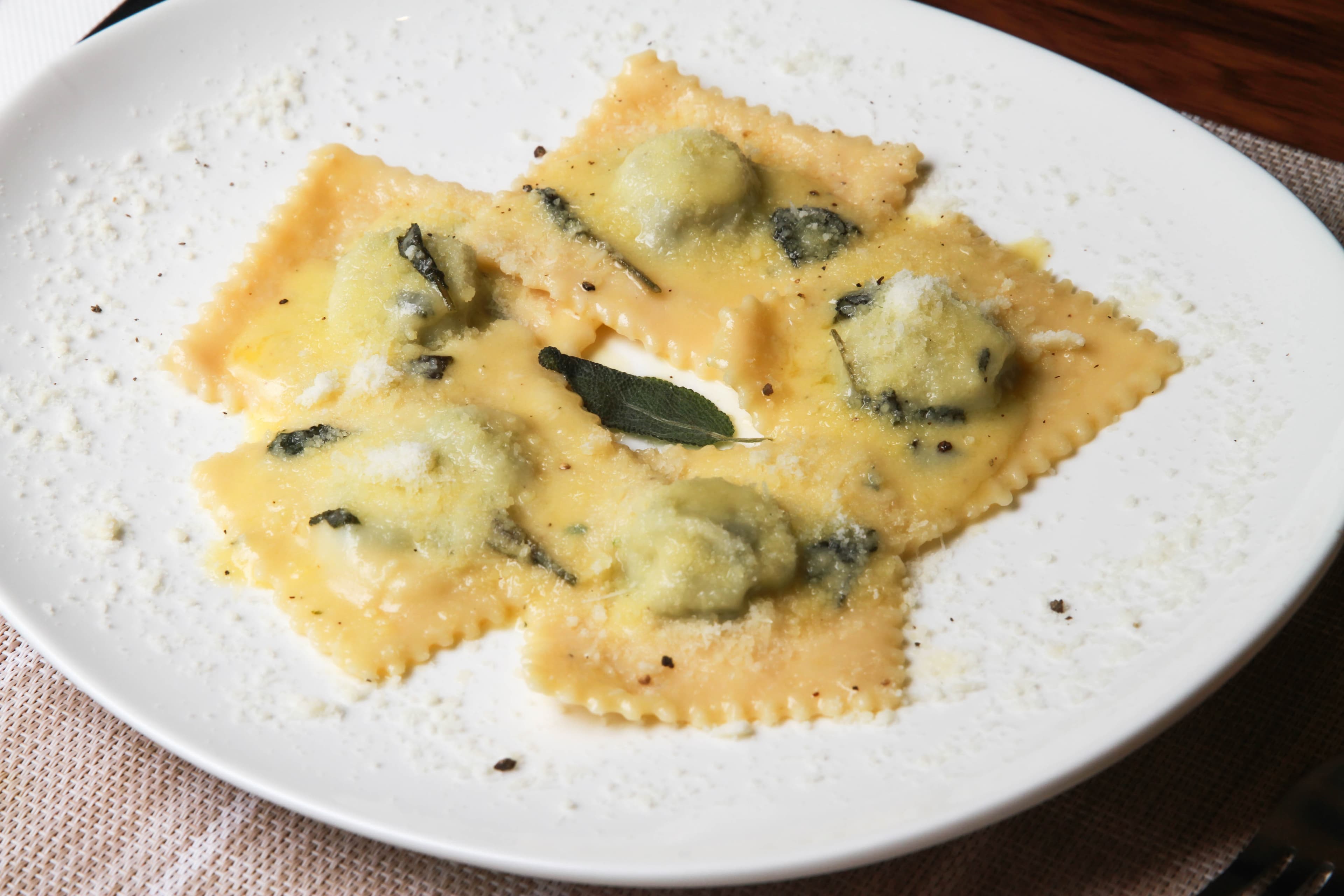 Hand-folded ravioli, ricotta and spinach